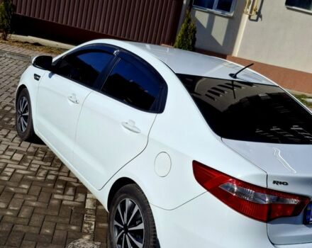 Белый Киа Рио, объемом двигателя 1.4 л и пробегом 87 тыс. км за 8750 $, фото 2 на Automoto.ua