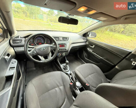 Білий Кіа Ріо, об'ємом двигуна 1.4 л та пробігом 299 тис. км за 5800 $, фото 13 на Automoto.ua