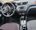 Белый Киа Рио, объемом двигателя 1.4 л и пробегом 153 тыс. км за 8300 $, фото 6 на Automoto.ua