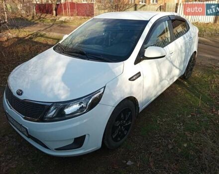 Білий Кіа Ріо, об'ємом двигуна 1.4 л та пробігом 87 тис. км за 8000 $, фото 13 на Automoto.ua