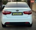 Белый Киа Рио, объемом двигателя 1.4 л и пробегом 73 тыс. км за 7950 $, фото 2 на Automoto.ua