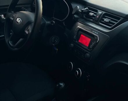 Білий Кіа Ріо, об'ємом двигуна 1.4 л та пробігом 258 тис. км за 6200 $, фото 14 на Automoto.ua