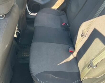 Білий Кіа Ріо, об'ємом двигуна 1.4 л та пробігом 210 тис. км за 5800 $, фото 11 на Automoto.ua