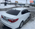 Білий Кіа Ріо, об'ємом двигуна 1.4 л та пробігом 216 тис. км за 7850 $, фото 7 на Automoto.ua