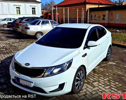 Білий Кіа Ріо, об'ємом двигуна 1.4 л та пробігом 87 тис. км за 8750 $, фото 2 на Automoto.ua