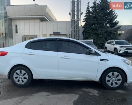 Белый Киа Рио, объемом двигателя 1.4 л и пробегом 216 тыс. км за 8560 $, фото 1 на Automoto.ua