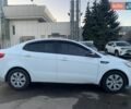 Белый Киа Рио, объемом двигателя 1.4 л и пробегом 216 тыс. км за 8560 $, фото 1 на Automoto.ua