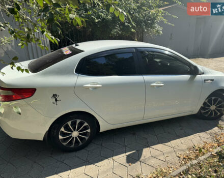 Білий Кіа Ріо, об'ємом двигуна 1.4 л та пробігом 94 тис. км за 7400 $, фото 2 на Automoto.ua