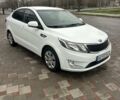 Білий Кіа Ріо, об'ємом двигуна 1.4 л та пробігом 121 тис. км за 8700 $, фото 1 на Automoto.ua
