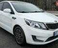 Білий Кіа Ріо, об'ємом двигуна 1.4 л та пробігом 124 тис. км за 7199 $, фото 13 на Automoto.ua