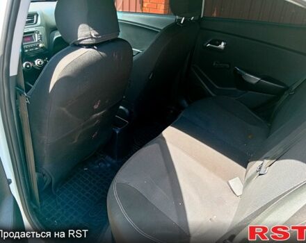 Білий Кіа Ріо, об'ємом двигуна 1.4 л та пробігом 213 тис. км за 7800 $, фото 9 на Automoto.ua
