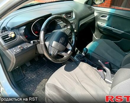 Білий Кіа Ріо, об'ємом двигуна 1.4 л та пробігом 213 тис. км за 7800 $, фото 7 на Automoto.ua