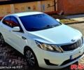 Білий Кіа Ріо, об'ємом двигуна 1.4 л та пробігом 87 тис. км за 8750 $, фото 4 на Automoto.ua