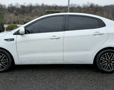 Білий Кіа Ріо, об'ємом двигуна 1.4 л та пробігом 124 тис. км за 7199 $, фото 1 на Automoto.ua