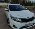Белый Киа Рио, объемом двигателя 1.4 л и пробегом 215 тыс. км за 5650 $, фото 1 на Automoto.ua