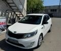 Білий Кіа Ріо, об'ємом двигуна 1.4 л та пробігом 221 тис. км за 5999 $, фото 1 на Automoto.ua