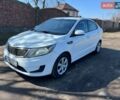 Білий Кіа Ріо, об'ємом двигуна 1.4 л та пробігом 210 тис. км за 5800 $, фото 1 на Automoto.ua