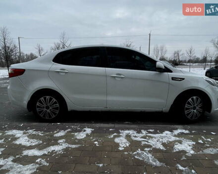 Білий Кіа Ріо, об'ємом двигуна 1.4 л та пробігом 210 тис. км за 6050 $, фото 7 на Automoto.ua