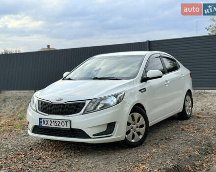 Білий Кіа Ріо, об'ємом двигуна 1.4 л та пробігом 299 тис. км за 5800 $, фото 11 на Automoto.ua