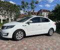 Білий Кіа Ріо, об'ємом двигуна 1.4 л та пробігом 84 тис. км за 9500 $, фото 1 на Automoto.ua