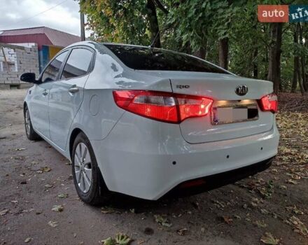 Белый Киа Рио, объемом двигателя 1.59 л и пробегом 172 тыс. км за 9000 $, фото 2 на Automoto.ua