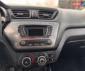 Білий Кіа Ріо, об'ємом двигуна 1.4 л та пробігом 169 тис. км за 5999 $, фото 12 на Automoto.ua