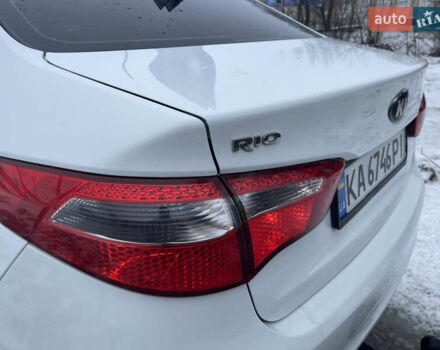 Білий Кіа Ріо, об'ємом двигуна 1.4 л та пробігом 216 тис. км за 7850 $, фото 15 на Automoto.ua
