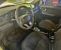 Білий Кіа Ріо, об'ємом двигуна 1.4 л та пробігом 179 тис. км за 7600 $, фото 8 на Automoto.ua