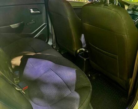 Білий Кіа Ріо, об'ємом двигуна 1.4 л та пробігом 179 тис. км за 7600 $, фото 5 на Automoto.ua