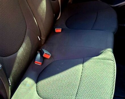 Білий Кіа Ріо, об'ємом двигуна 1.4 л та пробігом 87 тис. км за 8750 $, фото 13 на Automoto.ua