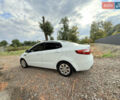 Белый Киа Рио, объемом двигателя 1.4 л и пробегом 299 тыс. км за 6100 $, фото 5 на Automoto.ua