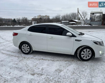 Белый Киа Рио, объемом двигателя 1.6 л и пробегом 148 тыс. км за 7550 $, фото 1 на Automoto.ua