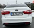 Білий Кіа Ріо, об'ємом двигуна 1.4 л та пробігом 124 тис. км за 7199 $, фото 9 на Automoto.ua