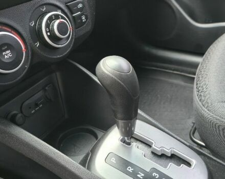 Білий Кіа Ріо, об'ємом двигуна 1.4 л та пробігом 124 тис. км за 7199 $, фото 19 на Automoto.ua