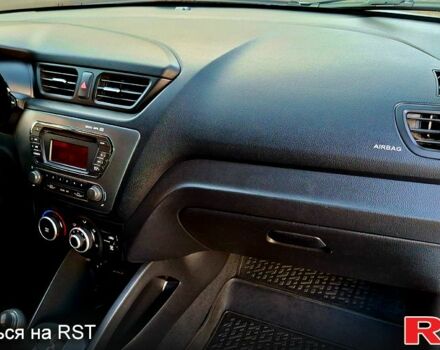 Білий Кіа Ріо, об'ємом двигуна 1.4 л та пробігом 87 тис. км за 8750 $, фото 6 на Automoto.ua