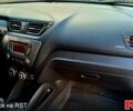 Білий Кіа Ріо, об'ємом двигуна 1.4 л та пробігом 87 тис. км за 8750 $, фото 6 на Automoto.ua