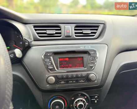 Білий Кіа Ріо, об'ємом двигуна 1.4 л та пробігом 299 тис. км за 5800 $, фото 24 на Automoto.ua