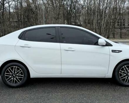 Білий Кіа Ріо, об'ємом двигуна 1.4 л та пробігом 124 тис. км за 7199 $, фото 7 на Automoto.ua