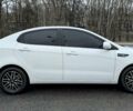 Білий Кіа Ріо, об'ємом двигуна 1.4 л та пробігом 124 тис. км за 7199 $, фото 7 на Automoto.ua