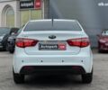 Білий Кіа Ріо, об'ємом двигуна 1.6 л та пробігом 105 тис. км за 8690 $, фото 9 на Automoto.ua