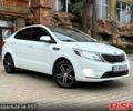 Білий Кіа Ріо, об'ємом двигуна 1.4 л та пробігом 101 тис. км за 9299 $, фото 1 на Automoto.ua