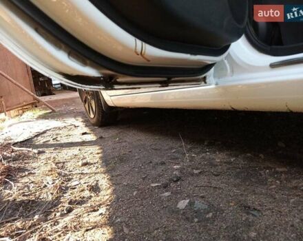 Білий Кіа Ріо, об'ємом двигуна 1.4 л та пробігом 87 тис. км за 8000 $, фото 8 на Automoto.ua