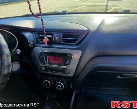 Белый Киа Рио, объемом двигателя 1.4 л и пробегом 176 тыс. км за 8499 $, фото 7 на Automoto.ua