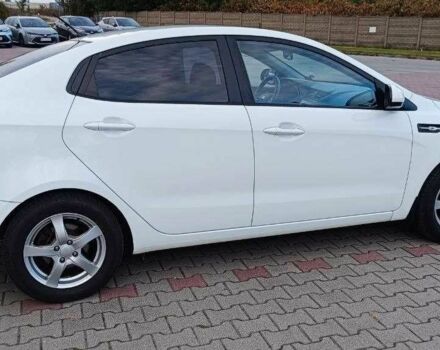 Білий Кіа Ріо, об'ємом двигуна 1.4 л та пробігом 99 тис. км за 9000 $, фото 4 на Automoto.ua