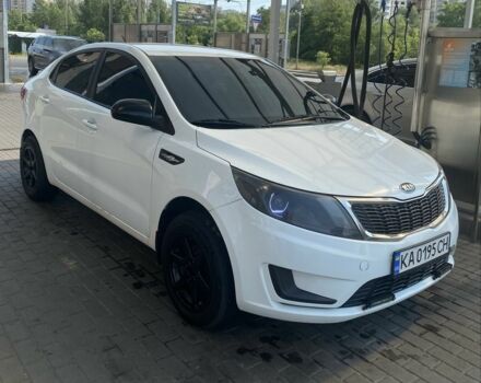 Белый Киа Рио, объемом двигателя 1.4 л и пробегом 255 тыс. км за 7000 $, фото 1 на Automoto.ua