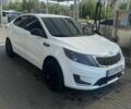 Белый Киа Рио, объемом двигателя 1.4 л и пробегом 255 тыс. км за 7000 $, фото 1 на Automoto.ua