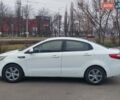 Белый Киа Рио, объемом двигателя 1.4 л и пробегом 340 тыс. км за 6500 $, фото 1 на Automoto.ua