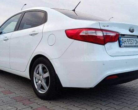 Білий Кіа Ріо, об'ємом двигуна 1.4 л та пробігом 99 тис. км за 9000 $, фото 6 на Automoto.ua