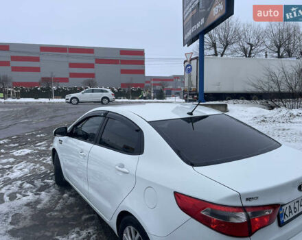 Білий Кіа Ріо, об'ємом двигуна 1.4 л та пробігом 216 тис. км за 7850 $, фото 10 на Automoto.ua