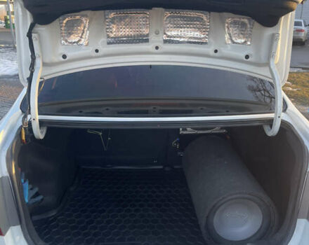 Білий Кіа Ріо, об'ємом двигуна 1.4 л та пробігом 248 тис. км за 7499 $, фото 11 на Automoto.ua